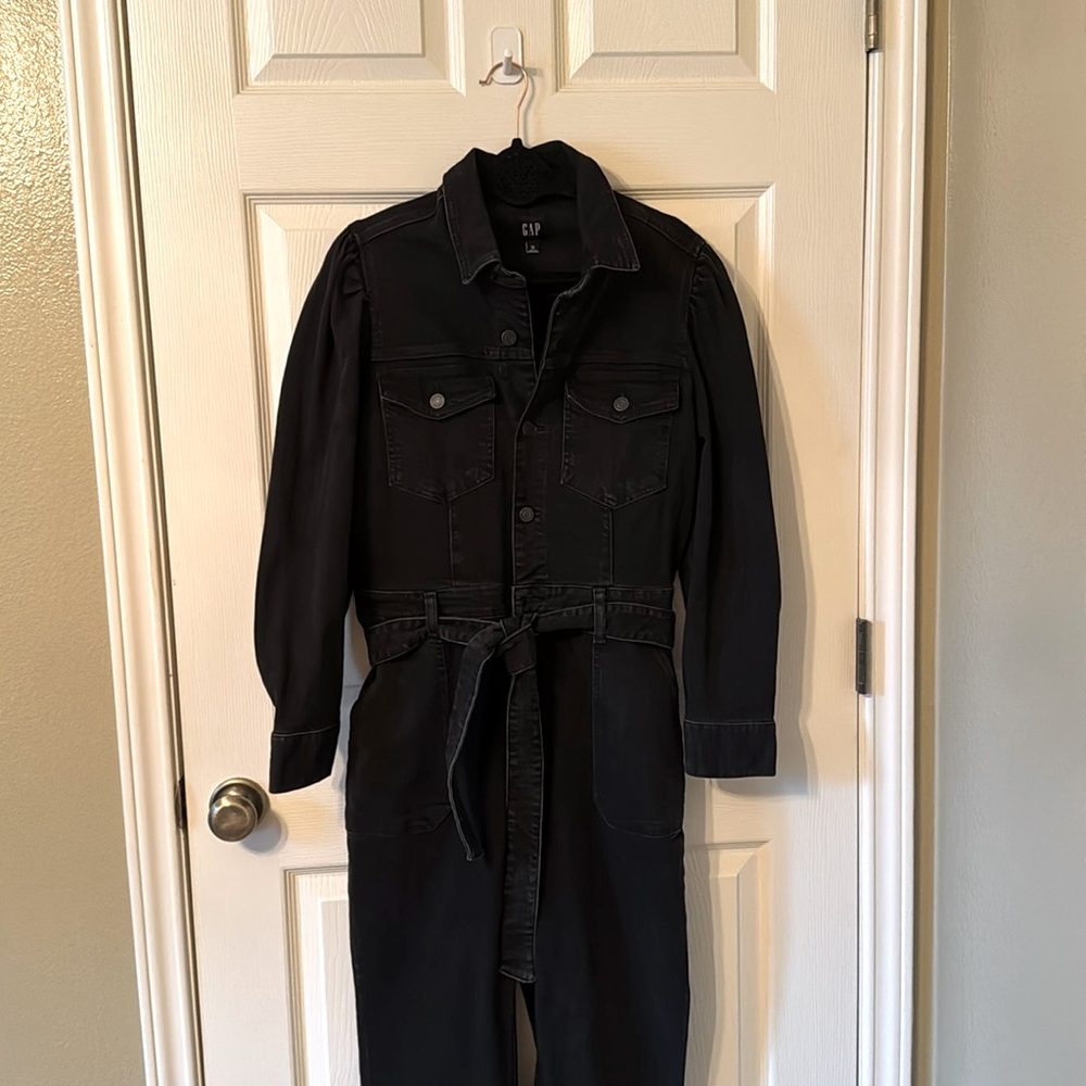 Black denim jumpsuit.